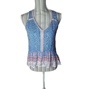 Patrons of Peace women's ruffle bottom sleeveless top